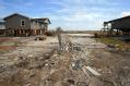 San Leon, TX, October 14, 2008 -- The homes on eighth street sit in front of Galveston Bay.  When Hurricane Ike struck one month ago, all the home...