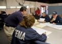 Beaumont, TX, October 31, 2008 -- FEMA community relation personnel plan their outreach campaign which is focusing on contacting FEMA applicants t...