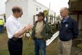 Galveston, TX, December 9, 2008 -- Deputy FEMA Administrator Harvey Johnson (l) speaking with Avelino Troncoso Jr. (c) in front of a new FEMA mobi...