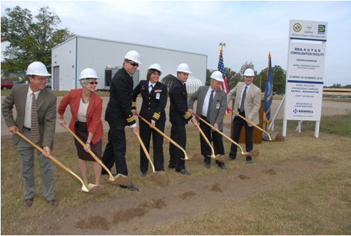 Breaking ground to officially commence construction on the Dahlgren Research Development and Acquisition and Test and Evaluation Consolidation Facility - left to right: Larry Willis, Director of Project Development for the Haskell Company; Susan Hudson, Naval Surface Warfare Center Dahlgren Division (NSWCDD) Electromagnetic and Sensor Systems Department Head; Cmdr. Dennis Quick, Executive Officer, Naval Support Facility South Potomac; Capt. Sheila Patterson, NSWCDD Commander; Capt. Jim Stader, Commander, Naval Facilities Engineering Command; Stuart Koch, NSWCDD Deputy Technical Director; and Tony Scaramozzi, Sites Liaison for Test and Evaluation, representing NSWCDD Warfare Systems Department