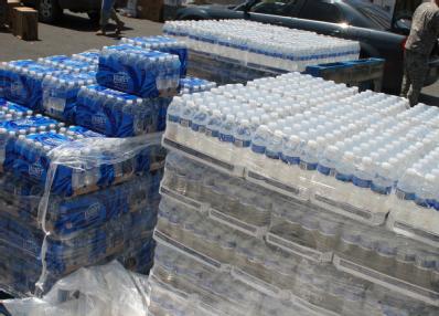Brownsville, TX, July 27, 2008 -- Pallets of Water are stacked, ready to be loaded into cars at the Brownie Community Center. Immediately followin...