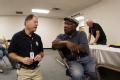 Austin, TX, 9/27/05  -- FEMA Disaster Recovery Center (DRC) manager Ellis Davis speaks with Paul Diggs Jr., a victim of hurricane Rita who is disp...