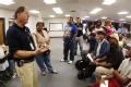 Austin, TX, 9/27/05  -- FEMA Disaster Recovery Center (DRC) manager Ellis Davis tells people waiting to call the FEMA hotline what to expect when ...