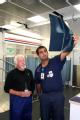 Plaquemines Parish, LA, November 7, 2005 - Radiologst Jim Borel and doctor Vivek Parwani look at a patient's digital X-ray taken in the innovative...