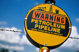 Image of sign reads: Warning Petroleum Pipeline