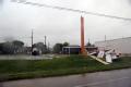 Brownsville, TX, July 23, 2008 -- Strong winds caused business signs to crumble and fall into streets. Hurricane Dolly crossed South Padre Island ...
