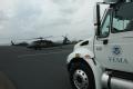 Welasco,TX, July 24, 2008 -- Texas Army National Guard Blackhawks at the Mid-Valley Airport with a FEMA truck. FEMA operations will join forces wi...