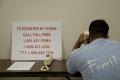 La Villa, TX, August 3, 2008 -- Texas resident calls to register for disaster assistance from a Disaster Recovery Center. People affected by Hurri...