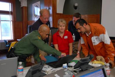 Brownsville, Texas, July 23, 2008 -- State, local, and federal partners work alongside nongovernmental volunteer organizations to assess needs and...