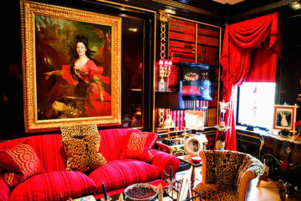  Comfort and warmth—as well as passion for the decorative arts, particularly silver objects and furniture—set the mood and tone in the Laquered Library of the Saunders Manhattan abode.  Nicolas de Largilliere’s portrait of a French Woman as Diana, c.1709 seems emblematic of Jordan Saunders’s ongoing hunt for astonishing treasures. —Photo by Robert Adam Mayer 