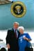 President George W. Bush met Ana Cooper upon arrival in Miami, Florida, on Monday, June 30, 2003. Cooper volunteers 20 hours each week through the Senior Companion program, offering assistance to older Americans in the Miami community.