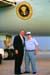 President George W. Bush met Robert W. Samuel upon arrival at Marine Corps Air Station Miramar, CA, on Thursday, August 14, 2003.  Samuel has been an active volunteer with the San Diego Armed Services YMCA for the past 20 years.