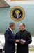 President George W. Bush met Father Mark Reyling upon arrival in St. Louis, Missouri, on Friday, May 14, 2004.  Father Reyling is an active volunteer with the Cahokia, Illinois Volunteer Fire Department and the Cahokia Police Department.  