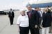 President George W. Bush met Sister Joan Marie Coleman upon arrival in Charleston, West Virginia, on Sunday, July 4, 2004. Coleman is an active volunteer with the Red Cross.
