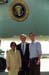 President George W. Bush met Laura Clipper and Nir Eyal, two volunteers who have been active with Hands On Atlanta, on his arrival in Atlanta, Georgia. He recognized Clipper and Eyal as examples of the lifetime commitment to service he is hoping to instill in all  Americans.