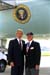 President George W. Bush met Herbert Rettke upon arrival in Oklahoma City, Oklahoma, on Thursday, August 29, 2002. Rettke, a U.S. Army veteran, works as a full-time volunteer for the Oklahoma City Veterans Administration Medical Center. 