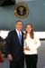 President George W. Bush met Sarah Hope Reilly upon arrival in Cincinnati, Ohio, on Monday, October 7, 2002. Reilly is a senior at Walnut Hills High School who volunteers each week tutoring younger children. 