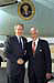 President George W. Bush met Robert Langley upon arrival in Atlanta, Georgia, on Thursday, February 20, 2003. Langley is a longtime volunteer with Hospice Atlanta and the American Cancer Society’s Road to Recovery program.