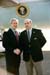 President George W. Bush met Denny Klaseus upon arrival in Fresno, California, on Wednesday, October 15, 2003.  Klaseus, 49, is an active volunteer at The First Church of the Nazarene in Visalia and the Ruiz 4 Kids scholarship committee.