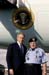 President George W. Bush met Gordon Stanley upon arrival in Palm Beach, Florida, on Thursday, January 8, 2004.  Stanley, 80, has been an active volunteer with the Delray Beach Police Department since 1996.