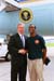 President George W. Bush met Brandon Gray upon arrival in Atlanta, Georgia, on Monday, May 17, 2004.  Gray is an active volunteer with Jumpstart Atlanta, an early literacy organization that recruits, trains, and places college students in one-on-one mentoring relationships with children in early learning programs.  