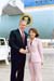 President George W. Bush met Alexandra Chung upon arrival in Baton Rouge, Louisiana, on Friday, May 21, 2004. Chung, a graduating senior at Louisiana State University, is an active volunteer tutor helping adults and young people improve their reading and academic skills.