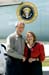 President George W. Bush met Marj Kamrath upon arrival in Sioux City, Iowa, on Saturday, August 14, 2004.  Kamrath is an active volunteer with the Food Bank of Siouxland. 