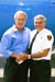 President George W. Bush met Roy Boso upon arrival in Parkersburg, West Virginia, on Sunday, September 5, 2004.  Boso, 75, is an active volunteer with the Lubeck Volunteer Fire Department.