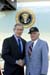 President George W. Bush met Bill Knight upon arrival in Bangor, Maine, on Thursday, September 23, 2004.  Knight, 82, organizes the Maine Troop Greeters to welcome military personnel when they arrive at Bangor International Airport from overseas deployments.  