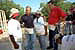 President Bush and Secretary for Housing and Urban Development Martinez, far right, talk with new friends during a break from their house-building efforts at the Waco, Texas, location of Habitat for Humanity's "World Leaders Build" construction drive August 8, 2001.