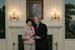President Bush presents the President's Volunteer Service Award to Army Reserve spouse Dawnle Scheetz from Sharon, Pennsylvania, before the White House celebration of  Military Spouse Day on Tuesday, May 6, 2008.  In 2006, Scheetz's husband, Major Larry Scheetz, was deployed to Iraq for a year with the 942nd Quartermaster Detachment from Fort Belvoir, Virginia.  During this time she created Operation School House to provide school supplies, clothing, and toys for Iraqi children.  Over an eight-month span, Scheetz collected five tons of supplies, which were packaged and shipped to Iraq and Afghanistan and distributed by the troops as gifts from American children.  In addition, she is a volunteer with the Mercer County Juvenile Community Court, a diversionary program composed of volunteers who determine appropriate consequences, including community service, tutoring, and substance abuse monitoring, for low-level first-time youth offenders.