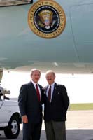 President George W. Bush met Jim Richardson upon arrival in Knoxville, Tennessee, on Monday, July 12, 2004.  Richardson, a retired Army Lieutenant Colonel, is an active volunteer with the Red Cross Disaster Assistance Team in Maryville, Tennessee. 