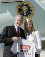 President George W. Bush presented the President’s Volunteer Service Award to Rebekah Rotton, 21, upon arrival at Hunter Army Airfield on Monday, October 30, 2006.  Rotton, a senior at Georgia Southern University, is a volunteer with a variety of programs which promote diabetes education and awareness.  To thank them for making a difference in the lives of others, President Bush honors a local volunteer, called a USA Freedom Corps Greeter, when he travels throughout the United States.  President Bush has met with more than 550 individuals around the country, like Rotton, since March 2002.