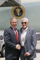 President George W. Bush met Ron Kelstrup upon arrival in Reno, Nevada, on Friday, June 18, 2004.  Kelstrup, 81, is an active volunteer at the Ioannis A. Lougaris VA Medical Center. 
