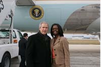 President George W. Bush presented the President’s Volunteer Service Award to Erin Green upon arrival in Chicago, Illinois, on Friday, January 6, 2006. Green is a volunteer with the James R. Jordan Boys and Girls Club and Family Life Center and the Daniel Murphy Scholarship Foundation. To thank them for making a difference in the lives of others, President Bush has met with more than 450 individuals around the country, like Green, since March 2002.