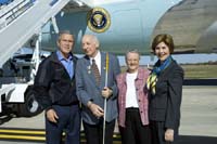 President George W. Bush met Jim Glaza upon arrival in Waterloo, Iowa, on Saturday, October 9, 2004.  Glaza, 76, has been an active volunteer with the Waterloo Lion’s Club for the past 40 years. 