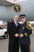 President George W. Bush presented the President’s Volunteer Service Award to Anthony Blackwell, Sr., upon arrival in Wilkes-Barre, Pennsylvania, on Friday, November 11, 2005.  Blackwell is a volunteer firefighter with the Mahanoy City Fire Department Citizens Fire Company.   To thank them for making a difference in the lives of others, President Bush has met with over 450 individuals around the country, like Blackwell, since March 2002.
