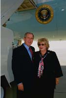 President George W. Bush met Laura Froehlich upon arrival in Riverside, California, on Wednesday, October 15, 2003.  Froehlich, 54, is a former member of the U.S. Air Force and an active volunteer at March Air Reserve Base since 1986.