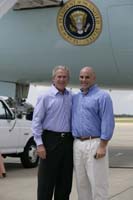 President George W. Bush presented the President’s Volunteer Service Award to Ken Wetzel upon arrival at the airport in Gulfport, Mississippi, on Monday, August 28, 2006.  Wetzel, a Biloxi native, is a volunteer with the Hope Crisis Response Network.  To thank them for making a difference in the lives of others, President Bush honors a local volunteer, called a USA Freedom Corps Greeter, when he travels throughout the United States.  President Bush has met with more than 500 individuals around the country, like Wetzel, since March 2002.