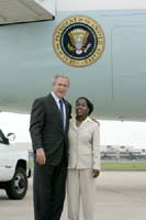 President George W. Bush met Daffney Moore upon arrival in St. Charles, Missouri, on Tuesday, July 20, 2004. Moore is an active volunteer with Connections to Success, a regional non-profit organization that provides services to help women and families in the welfare system improve their independence and economic self-reliance.