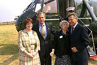 President George W. Bush met Helen Suchara and Erin Murray Chekal when he and Polish President Aleksander Kwasniewski arrived in Rochester, Michigan. Suchara, age 83, and Chekal, age 33, both served as Peace Corps volunteers in Poland and have continued their commitment to service after returning to Detroit.