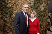 President George W. Bush met Marguerite Nobles during his trip to Ft. Polk, Louisiana, on Tuesday, February 17, 2004.  Since moving to Ft. Polk in 2000, Nobles has been an active volunteer in her community. 