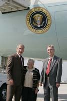 President George W. Bush presented the President’s Volunteer Service Award to Bill and Nina Hartman upon arrival in Atlanta, Georgia, on Friday, July 22, 2005.  The Hartmans volunteer with the Clayton County Retired and Senior Volunteer Program.   To thank them for making a difference in the lives of others, President Bush has met with more than 400 individuals around the country, like the Hartmans, since March 2002.