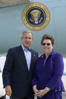 President George W. Bush met Kathy Hawkins upon arrival in Milwaukee, Wisconsin, on Friday, September 3, 2004.  Hawkins is an active volunteer with the Wisconsin State Veterans Home in King, Wisconsin.