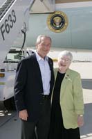 President George W. Bush presented the President’s Volunteer Service Award to Linda Cesario upon arrival in Chicago, Illinois, on Wednesday, August 10, 2005.  Cesario is an adult literacy volunteer through the Volunteer Center of Northwest Suburban Chicago.   To thank them for making a difference in the lives of others, President Bush has met with more than 400 individuals around the country, like Cesario since March 2002.