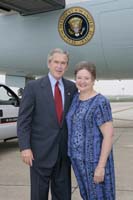 President George W. Bush presented the President’s Volunteer Service Award to Janice Bozardt upon arrival in Charlotte, North Carolina, on Friday, July 15, 2005.  Bozardt is a volunteer at Moore’s Chapel United Methodist Church, Holy Angels, and Power of the Past Tractor Club.   To thank them for making a difference in the lives of others, President Bush has met with more than 400 individuals around the country, like Bozardt, since March 2002.