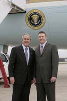 President George W. Bush presented the President’s Volunteer Service Award to Rob Mullin, Jr., upon arrival at the airport in Kansas City, Missouri, on Tuesday, March, 20, 2007.  Mullin is a volunteer with beHeadStrong.  To thank them for making a difference in the lives of others, President Bush honors a local volunteer when he travels throughout the United States.  President Bush has met with more than 575 individuals around the country, like Mullin, since March 2002.