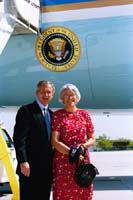 President George W. Bush met Anne Carroll upon arrival in Omaha, Nebraska on Monday, May 12, 2003. Carroll is an active volunteer with several local organizations who works closely with Habitat for Humanity on local and international projects to eliminate substandard housing. 