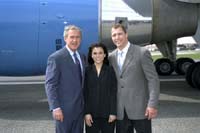 President George W. Bush met Scott Stevens and Marisa Fontainhas upon arrival in Newark, New Jersey, on Monday, June 16, 2003. Scott Stevens, defenseman and team captain of the 2003 Stanley Cup Champion New Jersey Devils, volunteers his time with several civic and charitable organizations. Fontainhas, a recent graduate of the New Jersey Institute of Technology, received a scholarship in 1998 from the New Jersey Nets and Devils Foundation as a result of her volunteer service in the Newark community. 