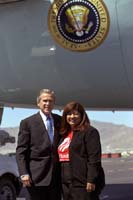 President George W. Bush met Rosario Piedra, a Girl Scout troop leader and an active volunteer in the El Paso community for over fifteen years, upon arrival in El Paso, Texas. He recognized Piedra as an example of the lifetime commitment to service he is hoping to instill in all Americans.